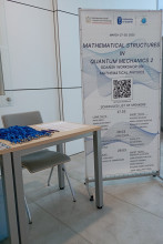 registration stall and a poster with a detailed schedule