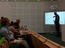speaker and participants in the lecture hall