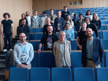 Marek Żukowski and participants in the lecture hall