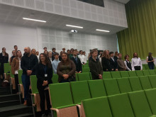 the audience stands up during the students' oath